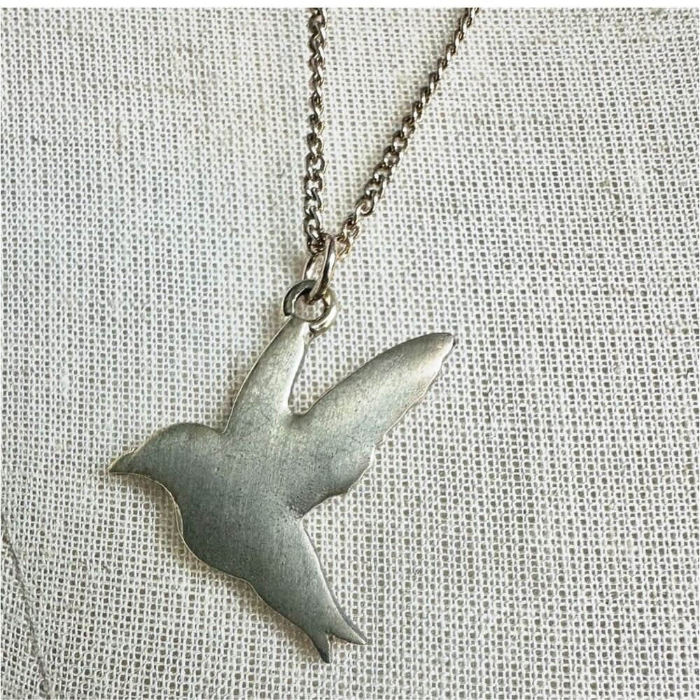 Flying bird pendant necklace